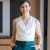 smiling-in-office-businesswoman-wearing-white-blo-2026-03-25-01-19-58-utc-scaled-1.jpg